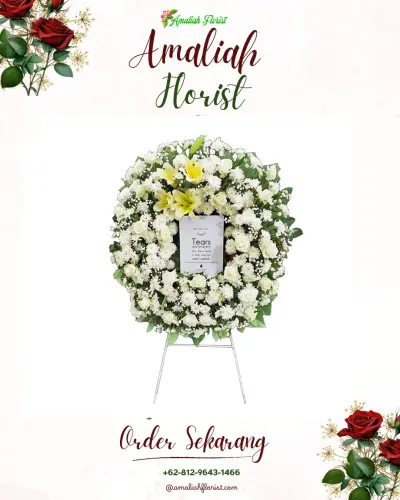Krans Bunga Duka Cita di Beringin Jaya